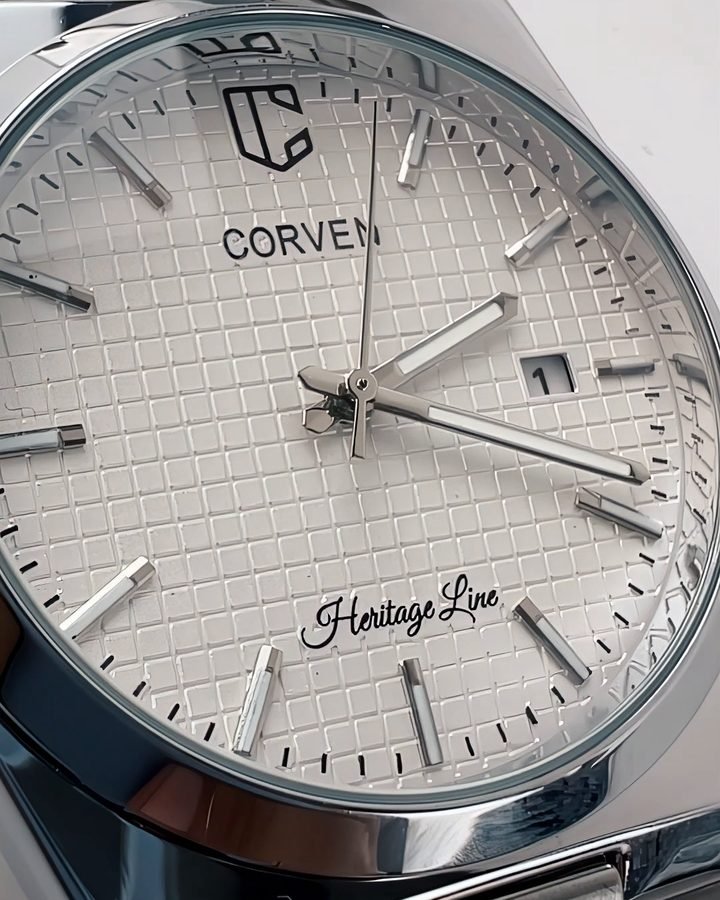 The waffle-textured dial of a Corven Heritage Line watch in close-up