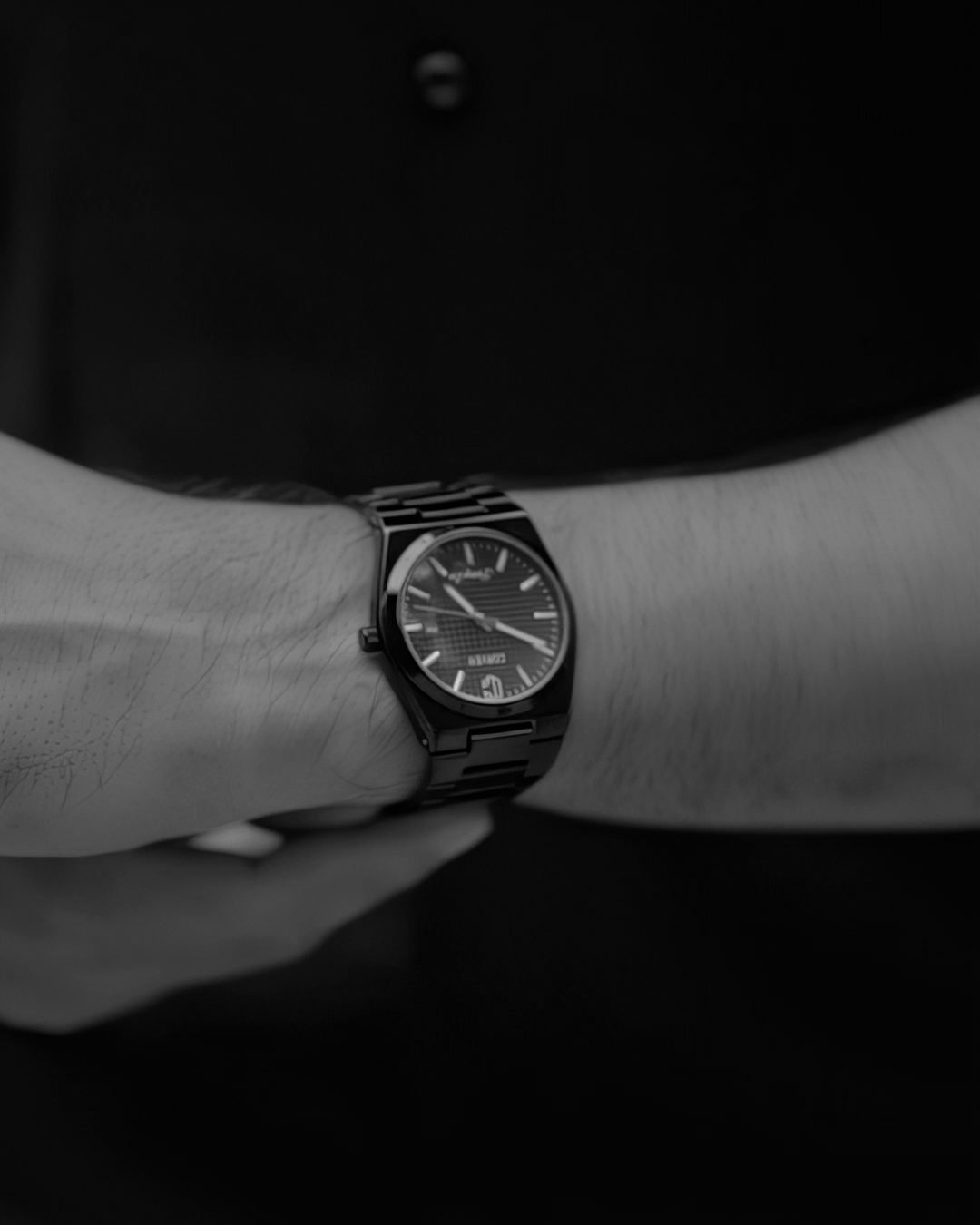 Corven Tenebris worn with a black shirt, photographed in black and white